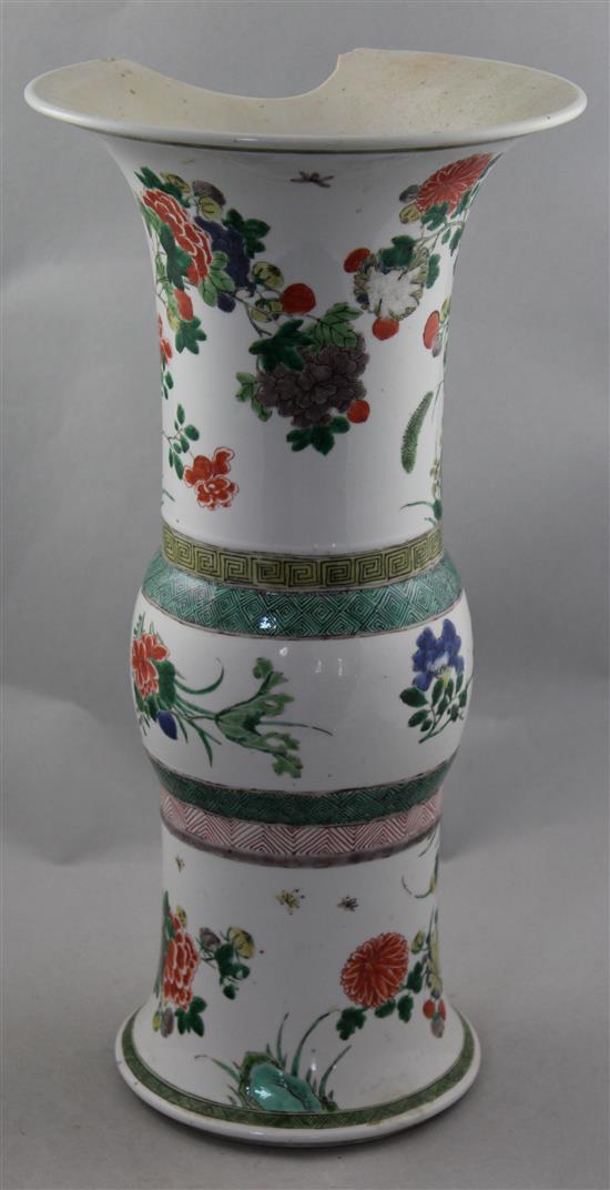 A large Chinese famille verte beaker vase, Gu, Kangxi period, 44.5cm, 11 x 3.5cm section of rim lacking